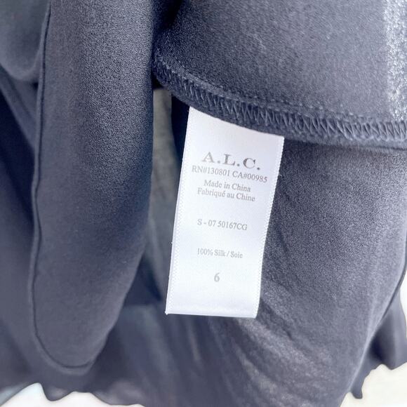 A.L.C. 100% Silk Crepe Tulip Hem Peplum Blouse Black Semi Sheer V Neck Womens 6 - Picture 9 of 9